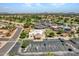 Overhead view of clubhouse area, tennis courts, pool and parking at 8541 W Rosemonte Dr, Peoria, AZ 85382