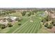 Scenic aerial view overlooking a meticulously maintained golf course and surrounding residential area at 8541 W Rosemonte Dr, Peoria, AZ 85382