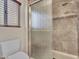 Close up of updated bathroom featuring a glass enclosed walk-in shower at 8541 W Rosemonte Dr, Peoria, AZ 85382