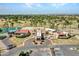 Aerial view of the community clubhouse with beautiful landscaping, and golf course views at 8541 W Rosemonte Dr, Peoria, AZ 85382