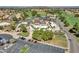 Overhead view of clubhouse area, tennis courts, pool and parking at 8541 W Rosemonte Dr, Peoria, AZ 85382