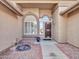 The covered front entryway provides a welcoming entrance to this home at 8541 W Rosemonte Dr, Peoria, AZ 85382