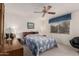 The main bedroom has nice lighting and a ceiling fan at 980 Leisure World --, Mesa, AZ 85206