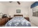 The main bedroom features nice lighting and a ceiling fan at 980 Leisure World --, Mesa, AZ 85206