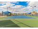 View of a well-maintained tennis court with blue and green surface and new nets at 980 Leisure World --, Mesa, AZ 85206