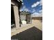 Backyard featuring a pergola with curtains, a table, and chairs at 10 N Agua Fria Ln, Casa Grande, AZ 85194