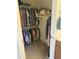 Walk-in closet with racks and shelves for storage at 10 N Agua Fria Ln, Casa Grande, AZ 85194