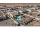 Panoramic aerial view highlighting a backyard with a pool, patio, and desert surroundings at 10256 W Appaloosa Trl, Casa Grande, AZ 85194