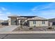 Beautiful single-story home with a well-manicured front yard and modern architecture at 10256 W Appaloosa Trl, Casa Grande, AZ 85194