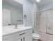 Bathroom featuring a white vanity with matte black hardware and shower/tub combo at 10839 W Peoria Ave, Sun City, AZ 85351