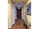 Inviting foyer featuring tile floors, decorative chandelier, and elegant entryway decor at 1131 W Sierra Madre Ave, Gilbert, AZ 85233