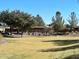 Community park view of play structures and green space for outdoor recreation and leisurely activities at 1131 W Sierra Madre Ave, Gilbert, AZ 85233