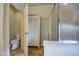 Bathroom with a toilet, cabinet, and shower at 1157 W Desert Lily Dr, San Tan Valley, AZ 85143