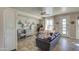 Living room showcasing a decorative fireplace and neutral-toned furniture at 1157 W Desert Lily Dr, San Tan Valley, AZ 85143