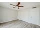 Bedroom featuring wood-look flooring and closet at 126 S Rita Ln, Chandler, AZ 85226