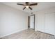 Bedroom featuring wood-look flooring and closet at 126 S Rita Ln, Chandler, AZ 85226