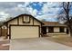 Spacious two-car garage and well-maintained exterior in a suburban neighborhood at 126 S Rita Ln, Chandler, AZ 85226