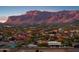 Wide aerial view of neighborhood featuring beautiful mountain views and desert vegetation at 12660 E Pivot Peak --, Gold Canyon, AZ 85118