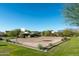 Community basketball court surrounded by green space and mountain views at 12660 E Pivot Peak --, Gold Canyon, AZ 85118