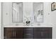 Bathroom with dual sinks, quartz countertops, dark wood cabinets, and modern fixtures at 12660 E Pivot Peak --, Gold Canyon, AZ 85118