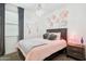 Cozy bedroom with a crystal chandelier, and a decor of paper flowers adorning the wall at 12660 E Pivot Peak --, Gold Canyon, AZ 85118