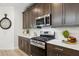 Close-up view of the kitchen featuring stainless steel appliances and plenty of counter space at 12660 E Pivot Peak --, Gold Canyon, AZ 85118