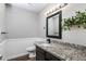 Chic bathroom with granite countertops, modern sink fixtures, and decorative wall accents at 1310 S Pima -- # 35, Mesa, AZ 85210