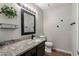 Stylish bathroom featuring granite countertops, modern fixtures, and decorative accents at 1310 S Pima -- # 35, Mesa, AZ 85210