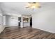 Spacious living room that opens up to the kitchen featuring luxury vinyl plank flooring at 1310 S Pima -- # 35, Mesa, AZ 85210