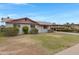 Quaint single-story home with a simple front yard and a covered carport at 1324 W 15Th St, Tempe, AZ 85281