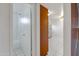 Hallway view of the kitchen and bathroom with tiled floors at 1324 W 15Th St, Tempe, AZ 85281