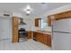 Kitchen with stainless steel appliances and light wood cabinets at 1324 W 15Th St, Tempe, AZ 85281