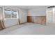 Bright living room features a window, carpet, and paneled accent wall at 1324 W 15Th St, Tempe, AZ 85281