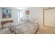 Comfortable bedroom with two twin beds, warm lighting, and stylish furnishings at 14266 N 2Nd Ave, Phoenix, AZ 85023