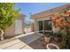 Private outdoor courtyard with desert landscaping and a tiled walkway at 14266 N 2Nd Ave, Phoenix, AZ 85023