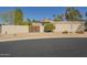 Property exterior showcasing a modern facade with desert landscaping and wood accents at 14266 N 2Nd Ave, Phoenix, AZ 85023