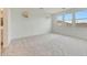 A carpeted bedroom with lots of natural light at 14770 W Tether Trl, Surprise, AZ 85387