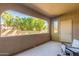 Relaxing outdoor patio featuring a view of lush green trees and landscaping at 15252 N 100Th St # 1156, Scottsdale, AZ 85260