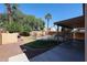 Fenced backyard featuring a private pool and patio at 17474 W Acapulco Ln, Surprise, AZ 85388