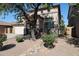 Charming two-story home featuring a low-maintenance desert landscape and inviting curb appeal at 17474 W Acapulco Ln, Surprise, AZ 85388