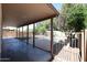 A covered patio with a view of the backyard pool at 17474 W Acapulco Ln, Surprise, AZ 85388