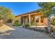 Charming home featuring desert landscaping, a covered patio, and a rock garden in the backyard at 1966 E Drake Dr, Tempe, AZ 85283