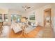 Bright living room features hardwood floors, ceiling fan, neutral colors and a sliding door to the outdoor space at 1966 E Drake Dr, Tempe, AZ 85283