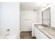 Bright bathroom with granite countertop, white cabinets, and modern fixtures at 22610 N 17Th St, Phoenix, AZ 85024