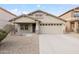 Charming single-story home featuring a two-car garage and low-maintenance desert landscaping at 22610 N 17Th St, Phoenix, AZ 85024