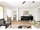 Bright and airy living room with wood floors, stylish décor, and neutral color palette at 22610 N 17Th St, Phoenix, AZ 85024