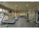 Bright gym with treadmills, exercise machines, weights, and mirrored wall at 2302 N Central Ave # 412, Phoenix, AZ 85004