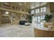 Spacious lobby featuring comfortable seating, decorative artwork, and tiled floors at 2302 N Central Ave # 412, Phoenix, AZ 85004