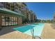 Beautiful pool area featuring clear blue water and comfortable lounge chairs for relaxation at 2302 N Central Ave # 412, Phoenix, AZ 85004