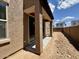 A covered back patio featuring a stained concrete flooring and stucco columns at 26029 N 23Rd Ave, Phoenix, AZ 85085